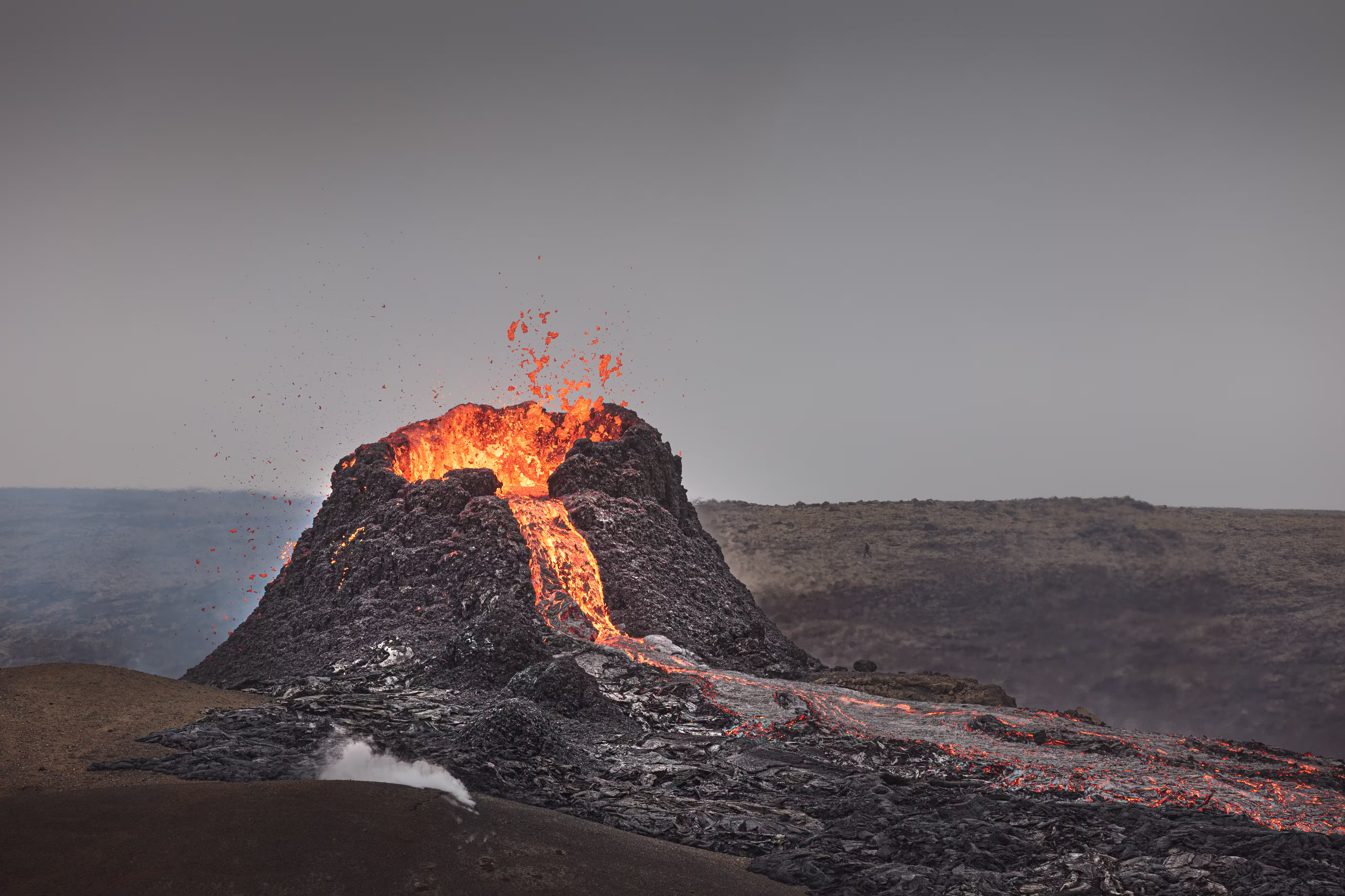 Active volcano with flowing lava in Iceland