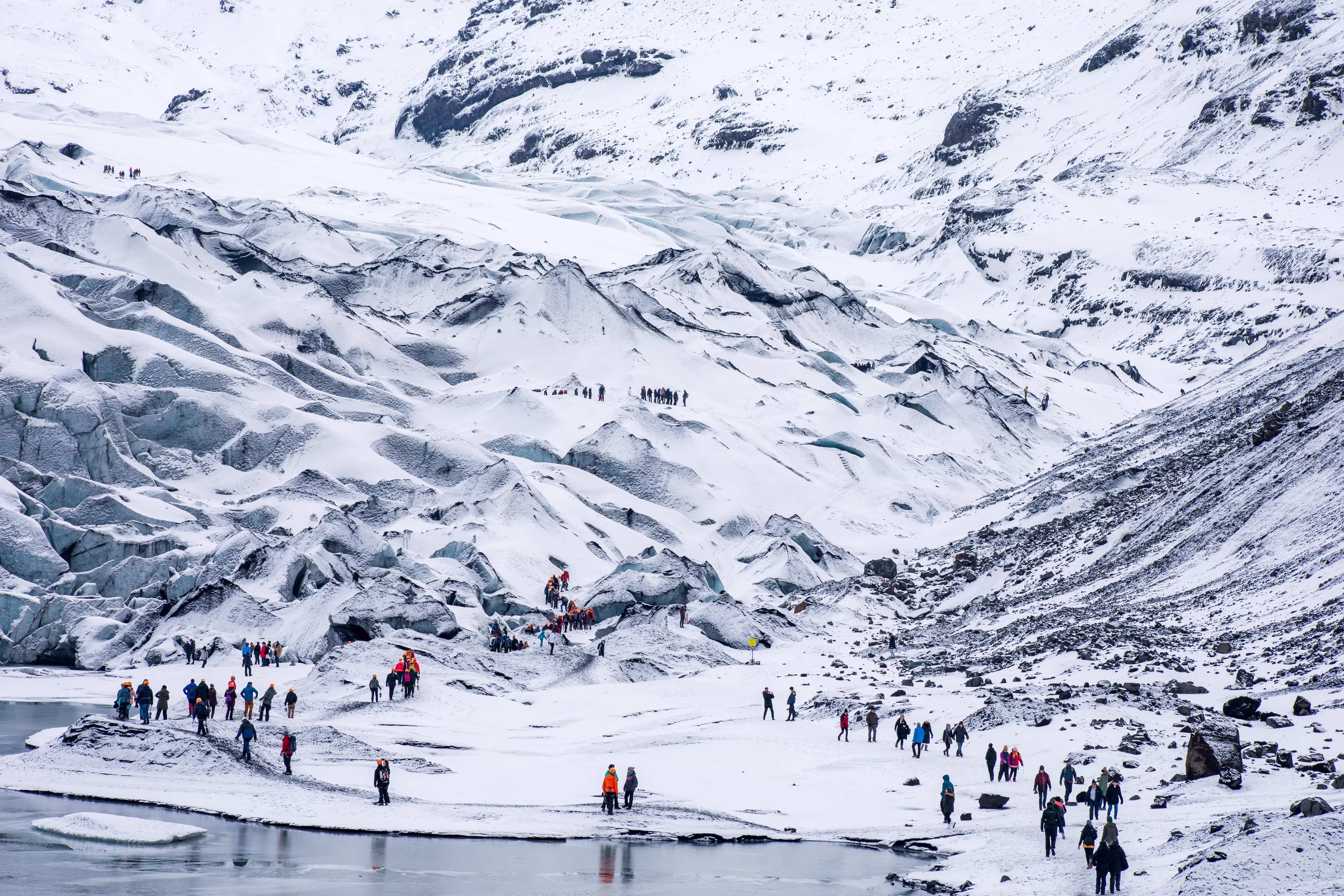 Hikers trekking through the snowy Chilean wilderness