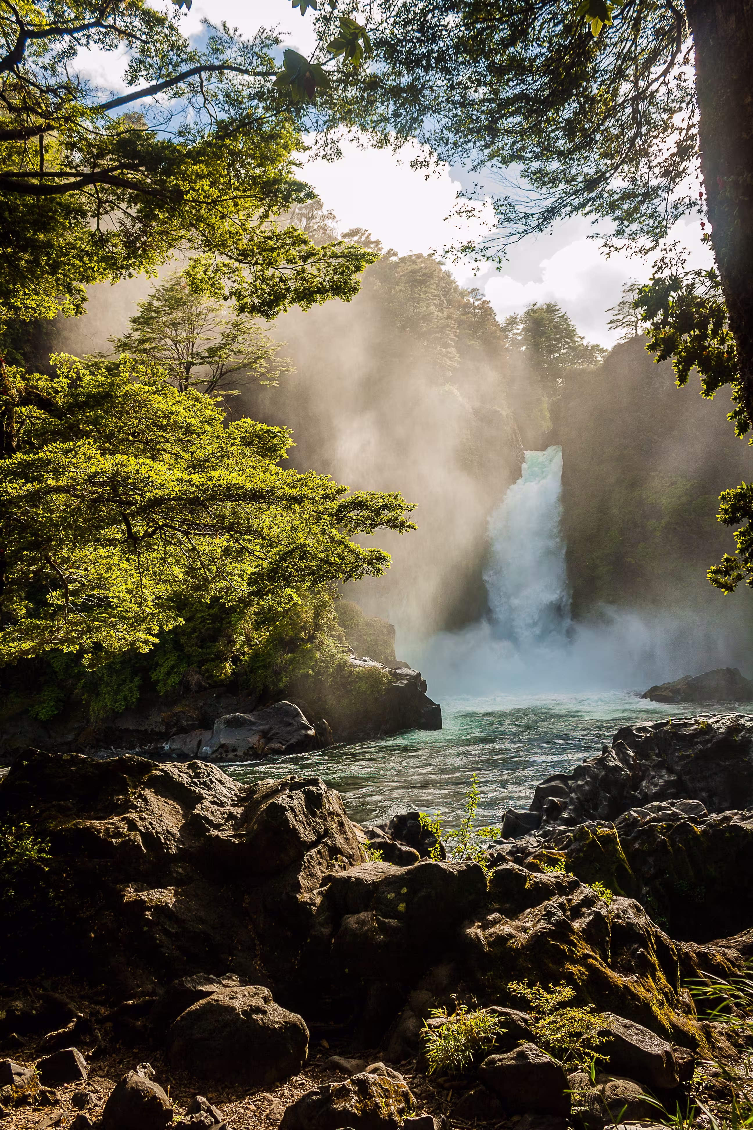 Waterfall surrounded by mountains