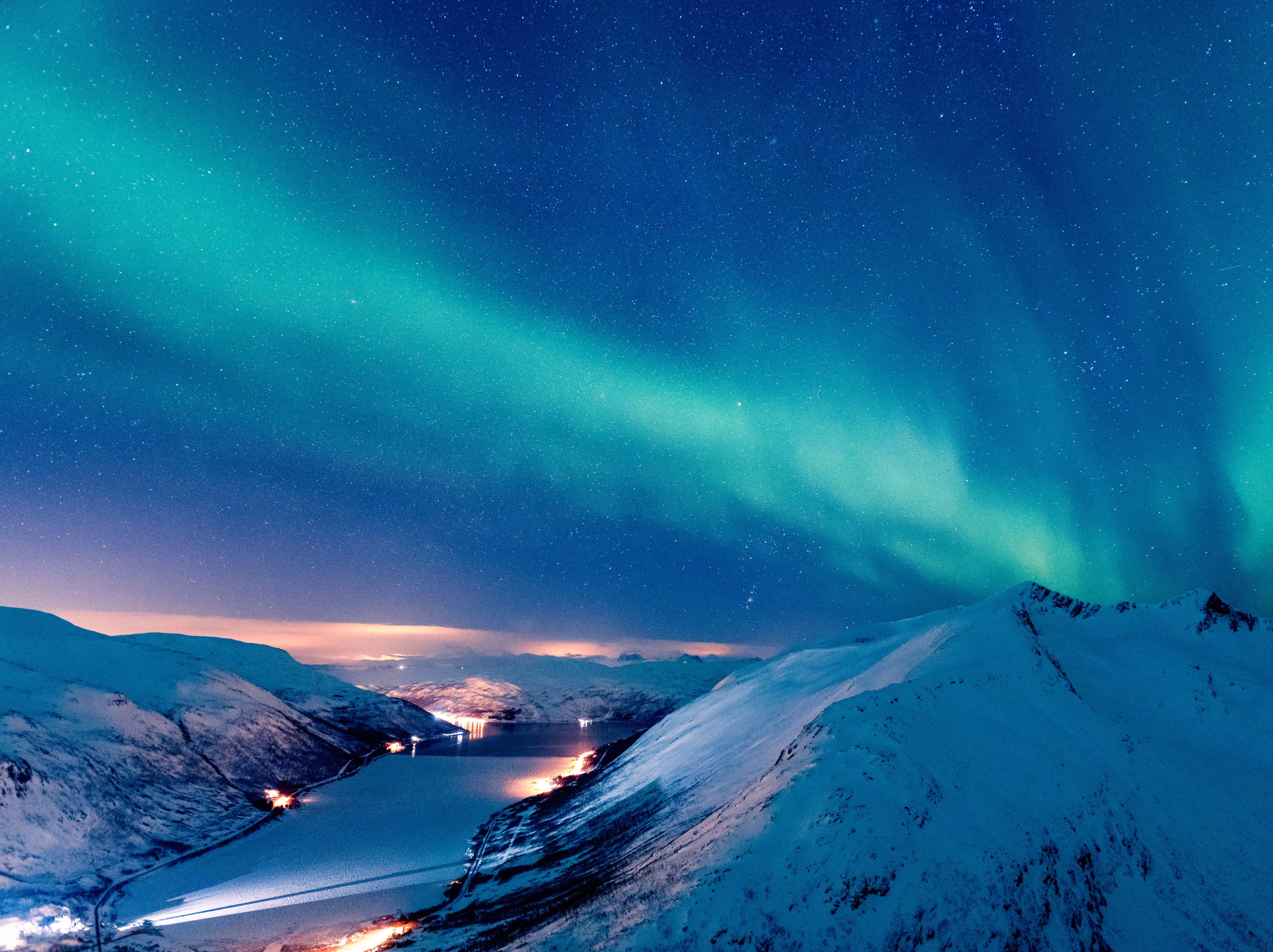vertical winter landscape with northern lights